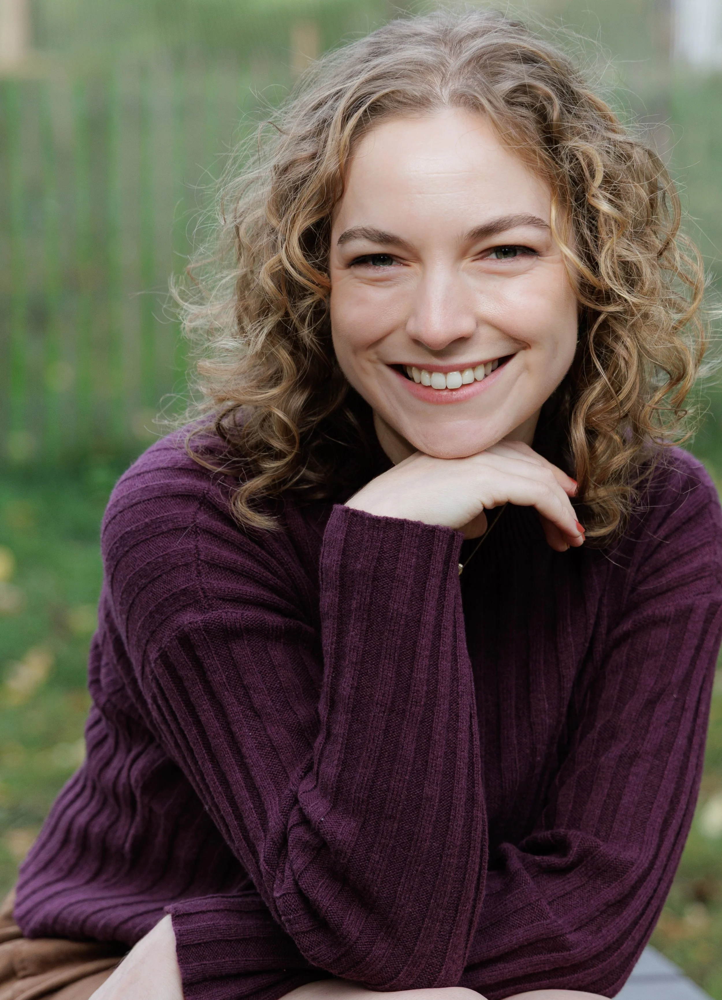 Gloria Bangiola fall headshot smiling cropped.jpg