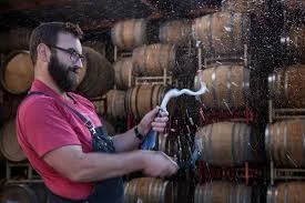 Michael Cruse disgorges a sparkling wine