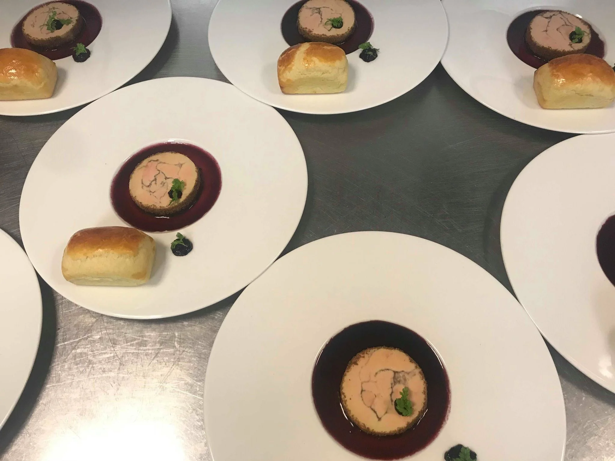 Coca cured foie gras, homemade elderberry jam & syrup with a brioche roll