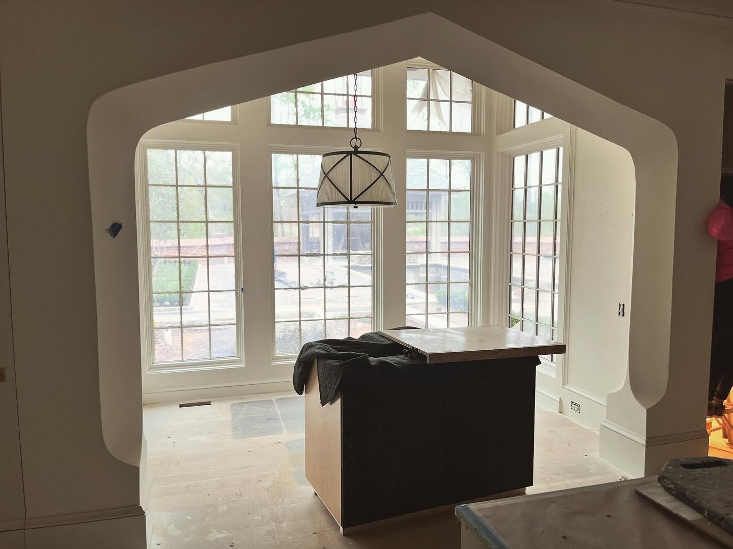Progress on our Shoal Creek Tudor, with a hazy peek through the bay window at the fabulous work of @stephen_w_hackney 
.
.
.
📸: @smoff15 
#architecture #tudor #arch #baywindow #kitchen #breakfastbay #light #residentialdesign #traditionalarchitecture