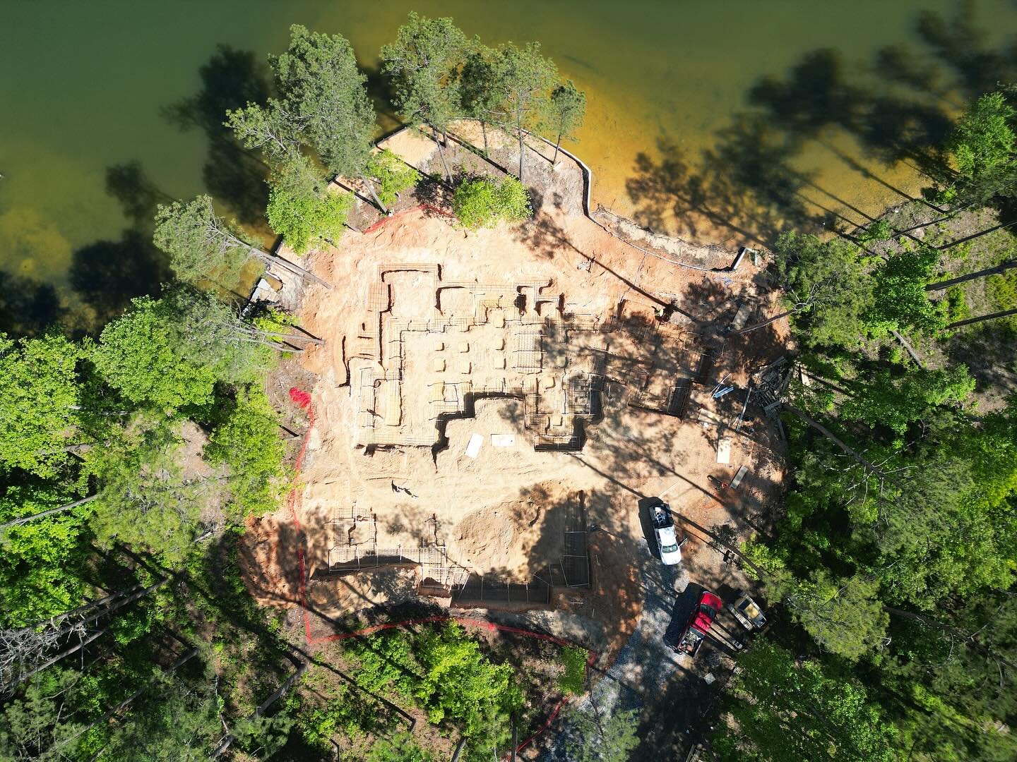 Progress on Lake Martin. The first of a few projects we have ongoing in The Heritage has broken ground with @tcc_contractors and is cruising right along. 
.
.
.
#architect #residentialdesign #lake #sitevisit #design #lakehouse #birdseyeview #lakemart