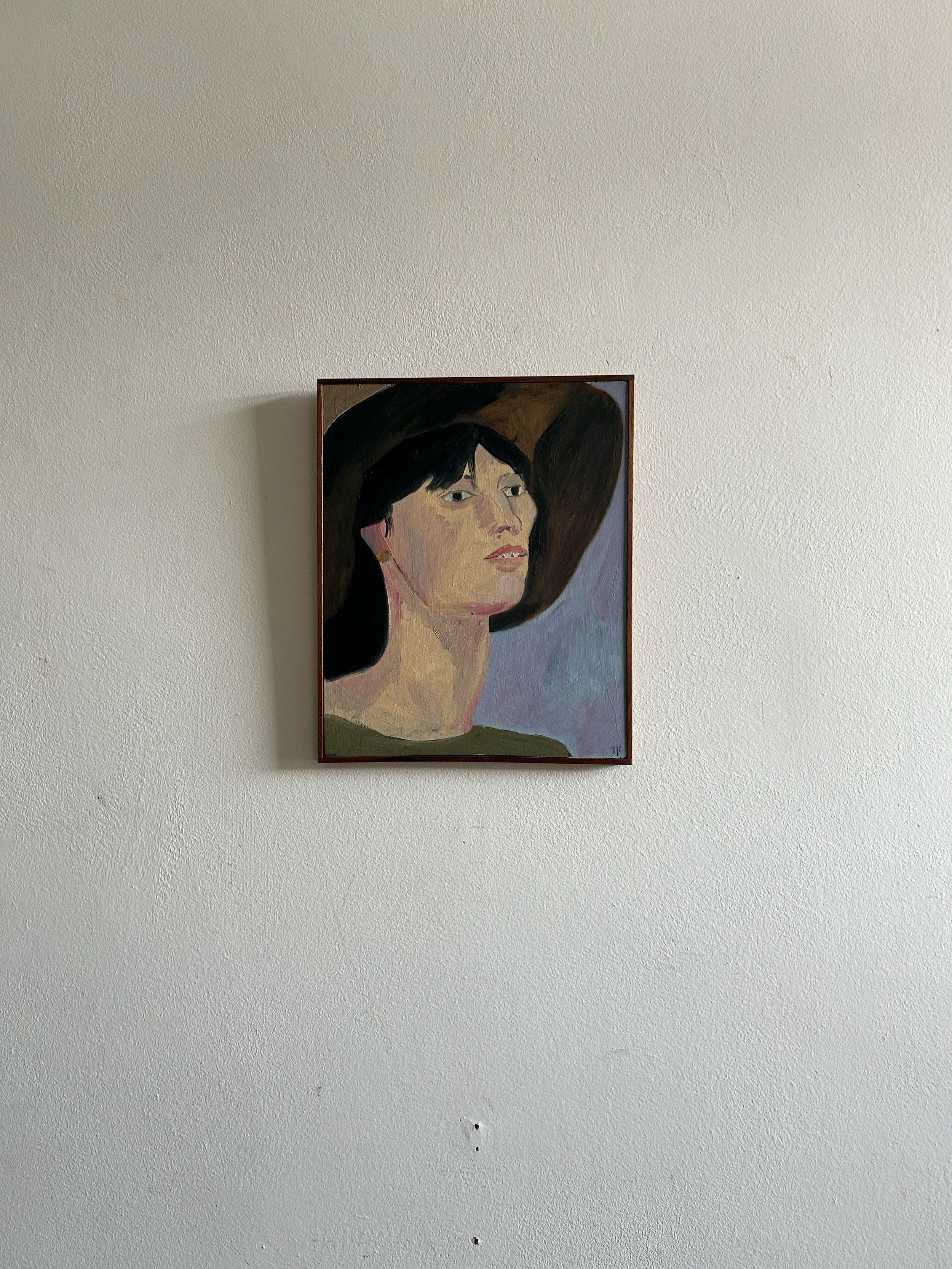 Woman Under Hat