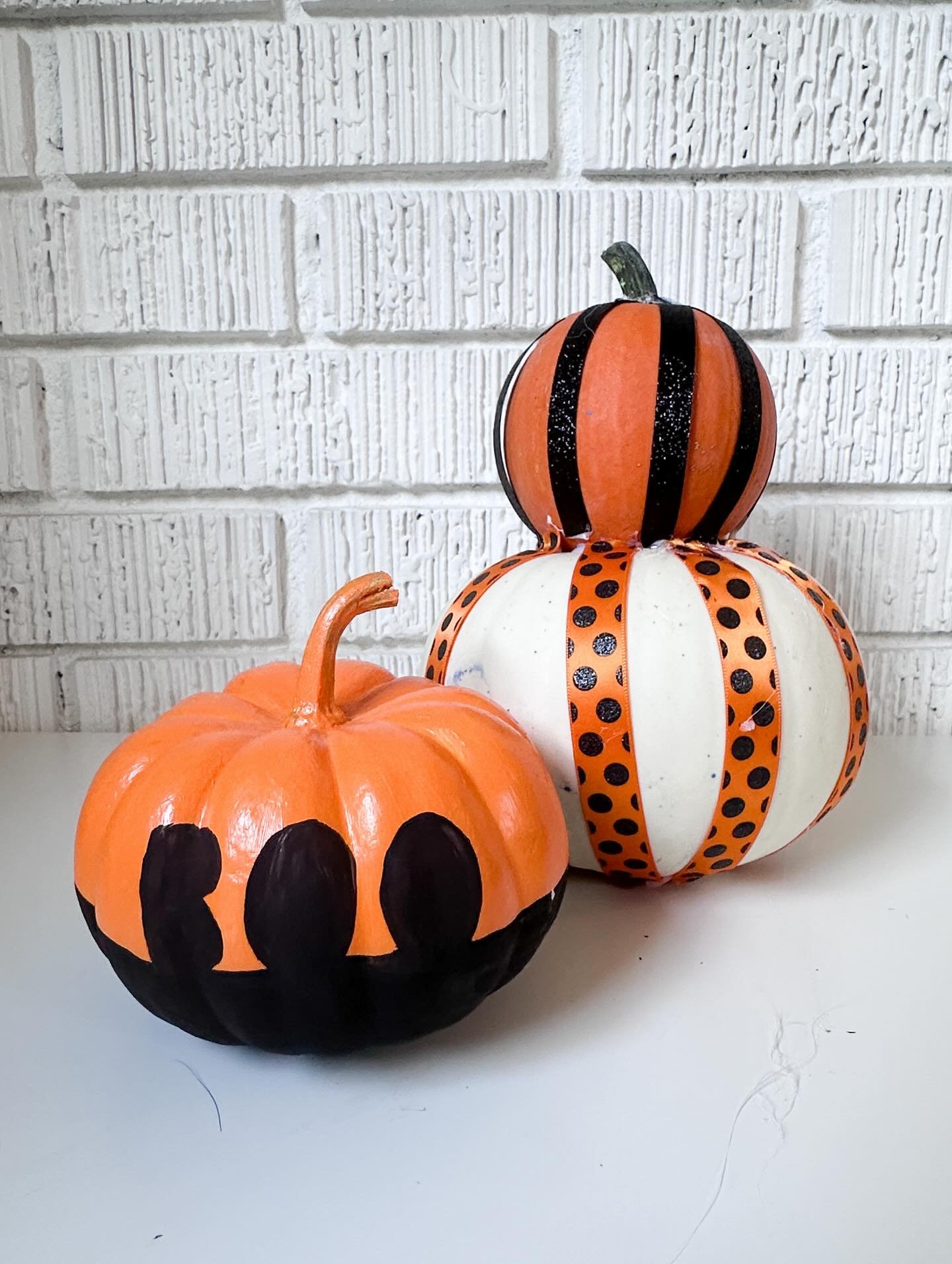 We missed a couple of years of our annual pumpkin painting tradition but got back into it this year. With a diverse range of approaches I present: 

👩🏼&zwj;🎨 The designer series
🥹 The cutie series 
🎸 The band series
🪶 The bird series 
👧🏽 The 