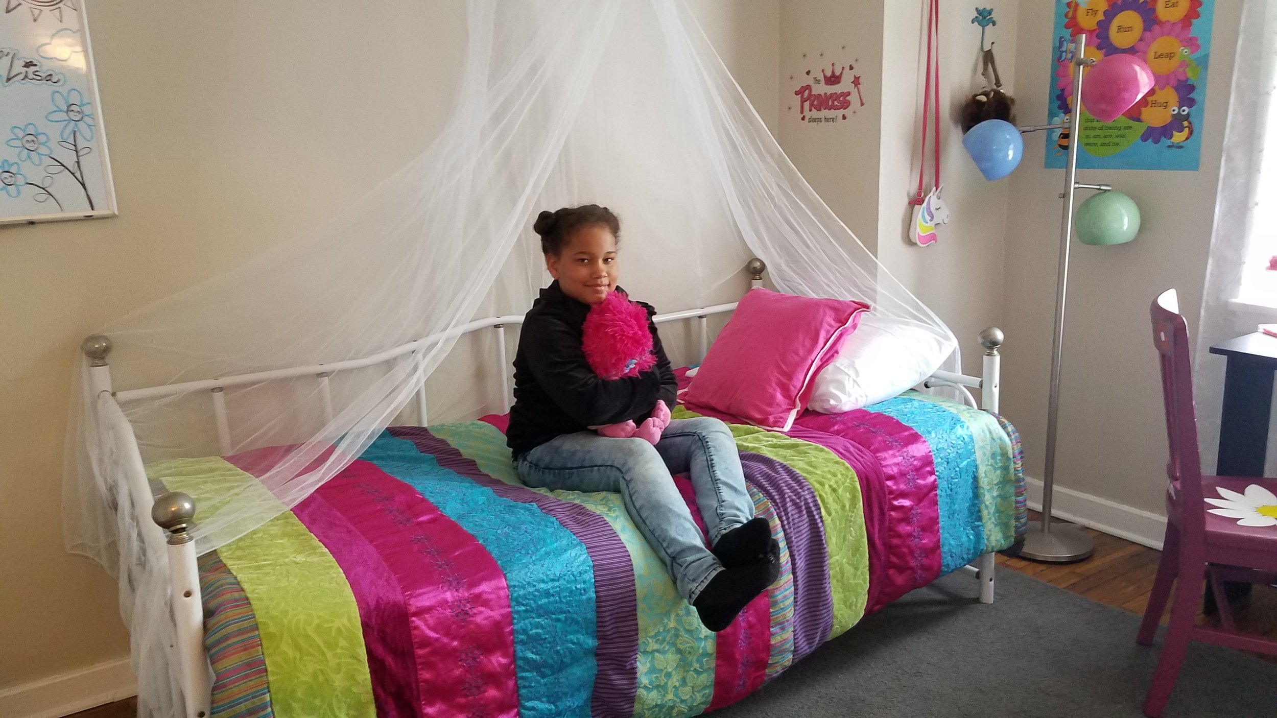 Colorful, comfortable and creative space for a beautiful little girl.