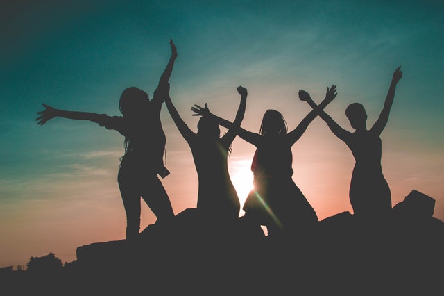backlit-dawn-friends-862848.jpg