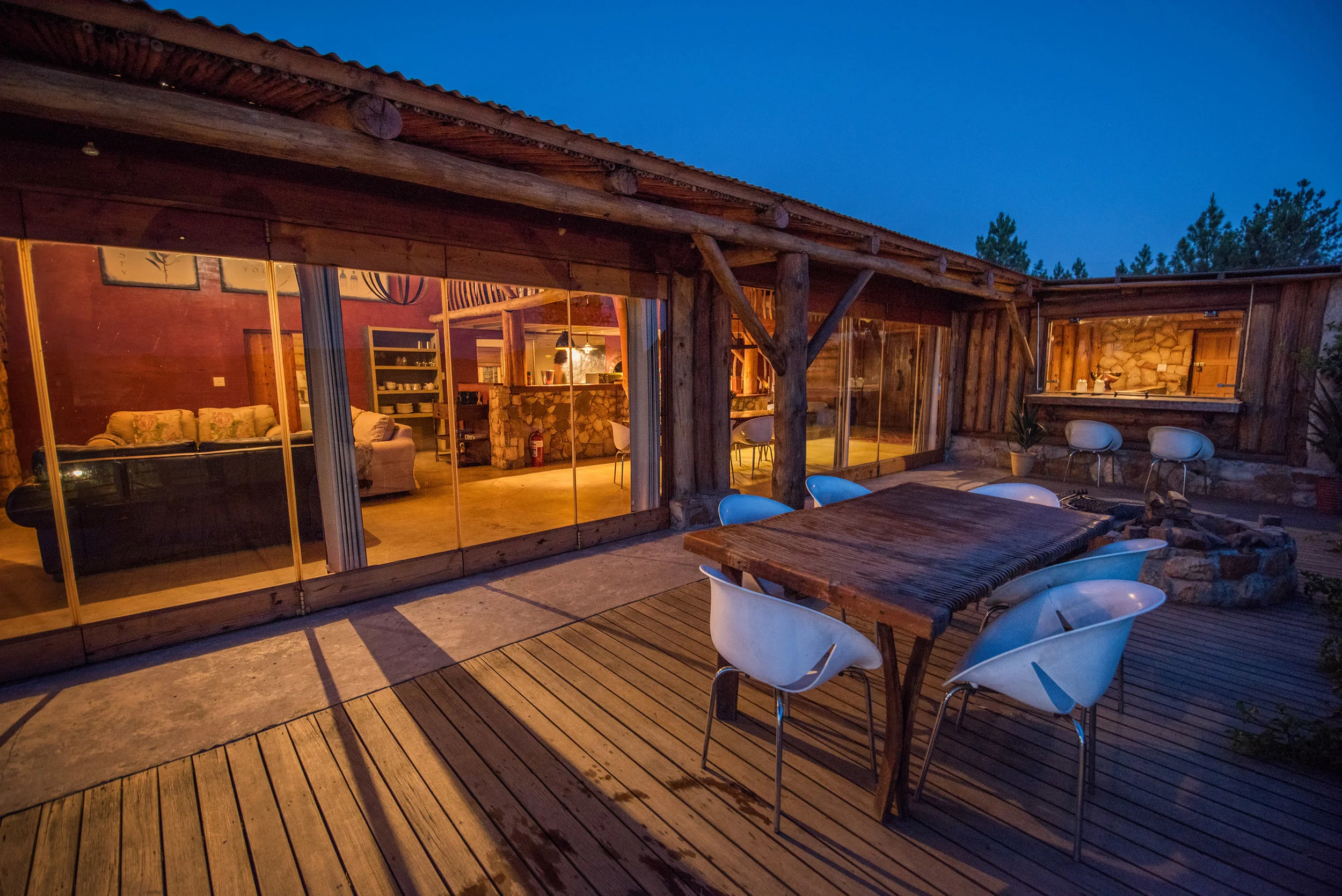 The deck and fire pit of King Cabin at the Kolkol Mountain Lodge.