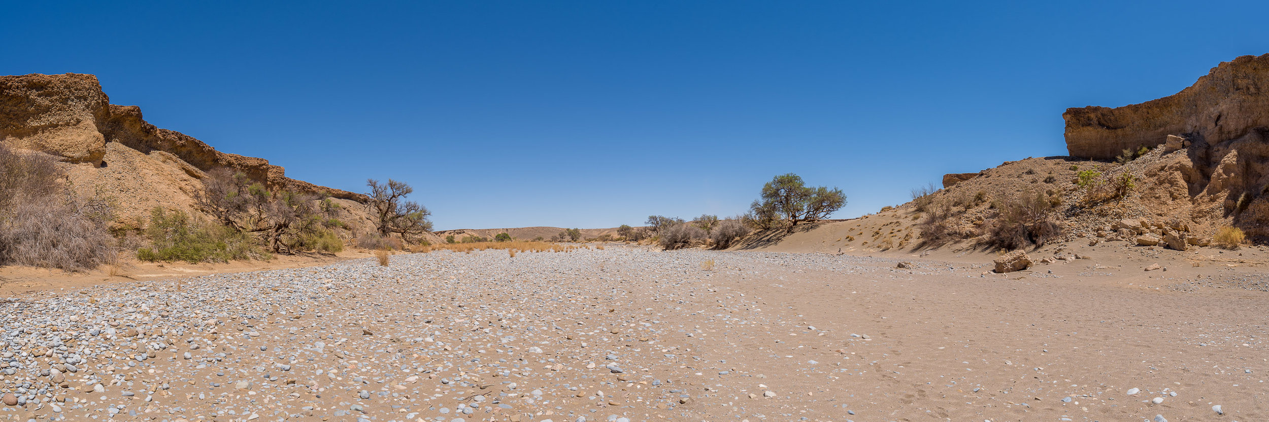 The mouth of Sesriem Canyon is only a couple of kilometers downstream from its head. Show's over folks. You can turn around.