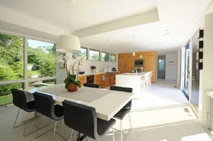 hamptons style, kitchen design, ligne roset, white interiors, white interior design, open floorplan, open kitchen, white textured floors, thin flooring, minimalist design, mid-century modern interior design, contemporary interior design, home staging, luxury living, kitchen, dining room