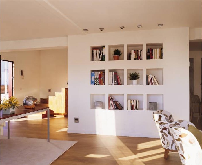Living Room, bookshelf styling, book shelves, mid-century modern living room, cozy living room, textured and patterned fabrics, contemporary design, open floor plan, home staging