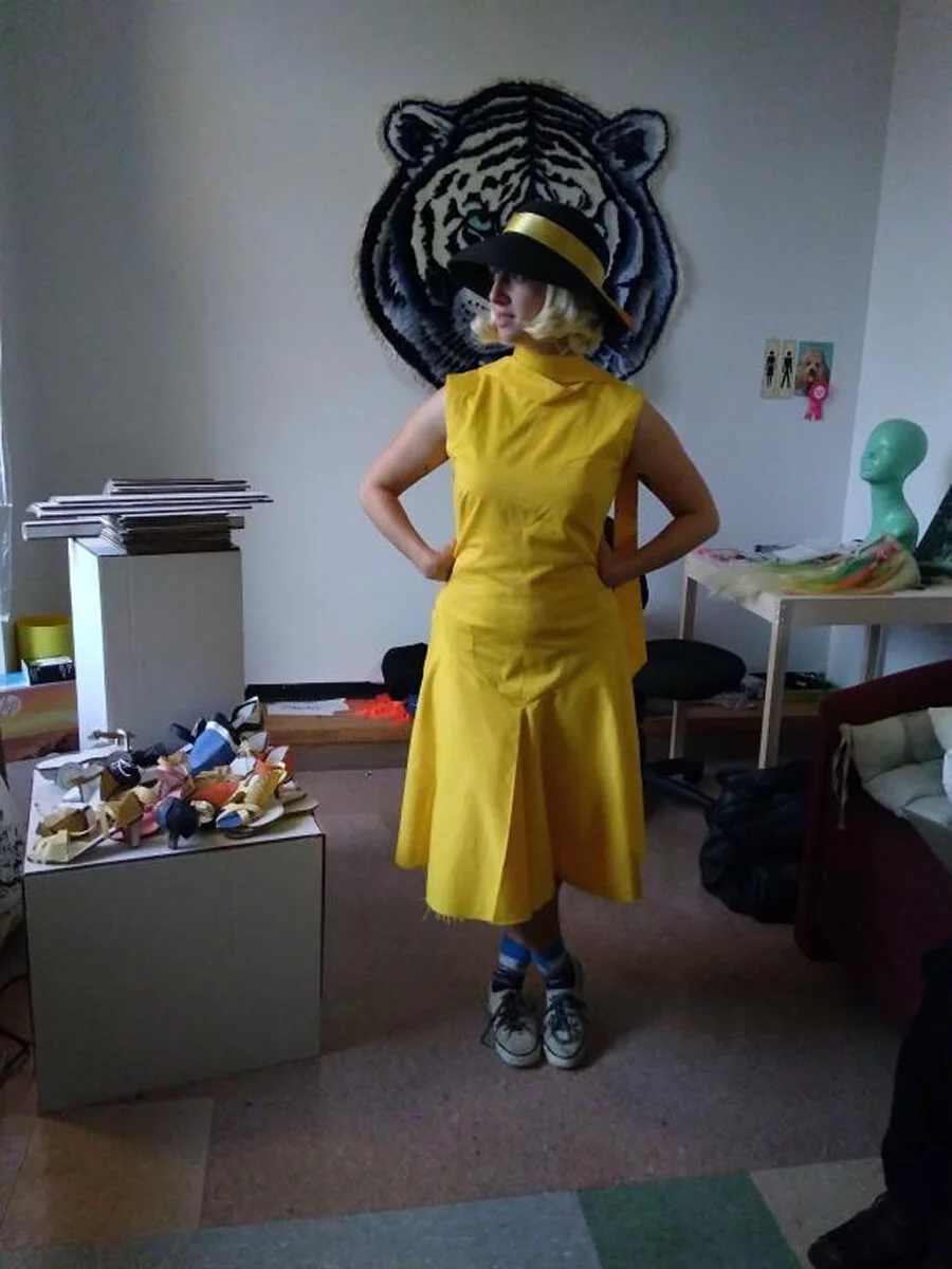 The dress was completed!! It took me about a week to sew. My parents were in town and helped me to get the yellow woven fabric from Queen Textiles, along with some coverable buttons for the back. They also helped me procure the yellow ribbon and blo…