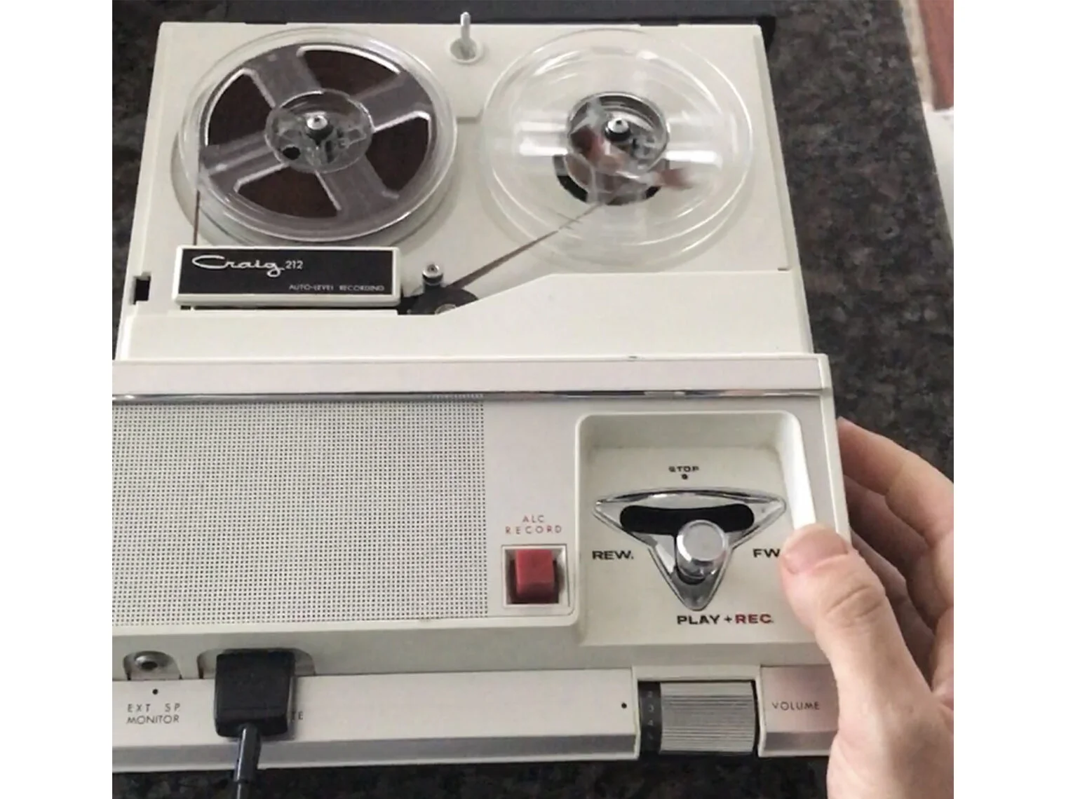 Here you can better see the working mechanisms and buttons that make the Craig 212 go. You can also see the label, covered up in the TV series. Instead of buttons, this recorder/player was designed with a snappy little joystick for each function. To…