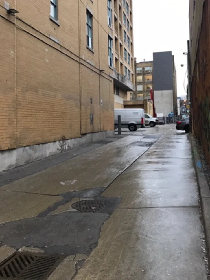 An alley nearby the galleries where I would wait, watching the live stream, waiting for visitors I could call on the rotary phone.