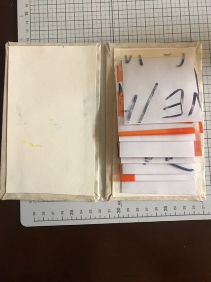 I made a mockup before creating the real thing, closer to the size of the original album. The mockup is from extra materials found around my studio, so the bookcloth is actually muslin from my sewing supplies over pieces of plywood, and the sleeves …