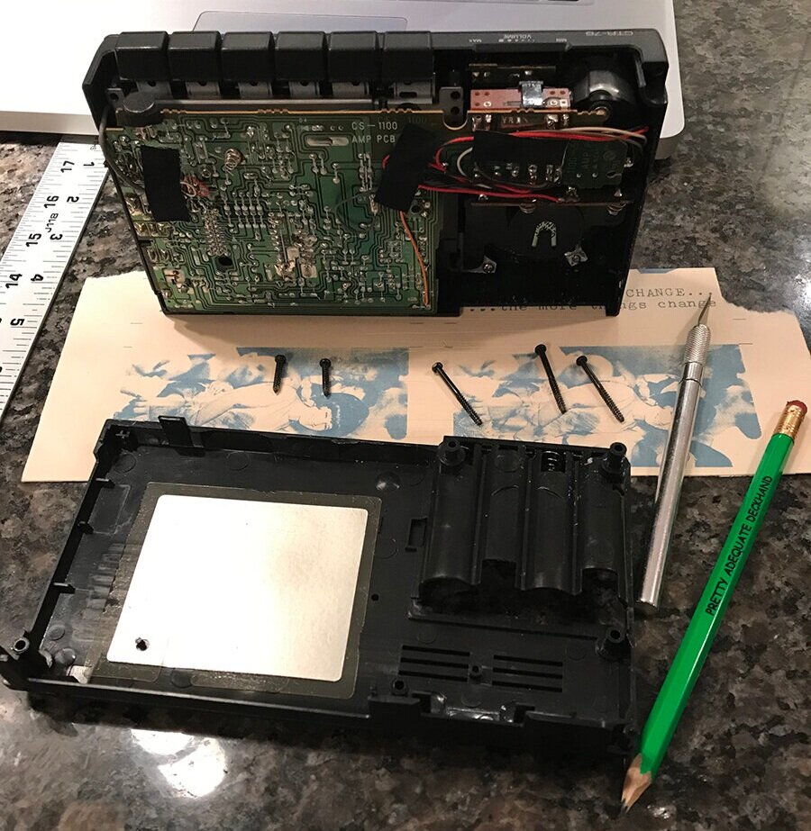 I also took apart the tape recorder so I could keep the volume down. For one thing, it’s quite unsettling to suddenly hear a whisper played back at a loud volume. The removal of the volume knob also required listeners to hold the tape player up to o…