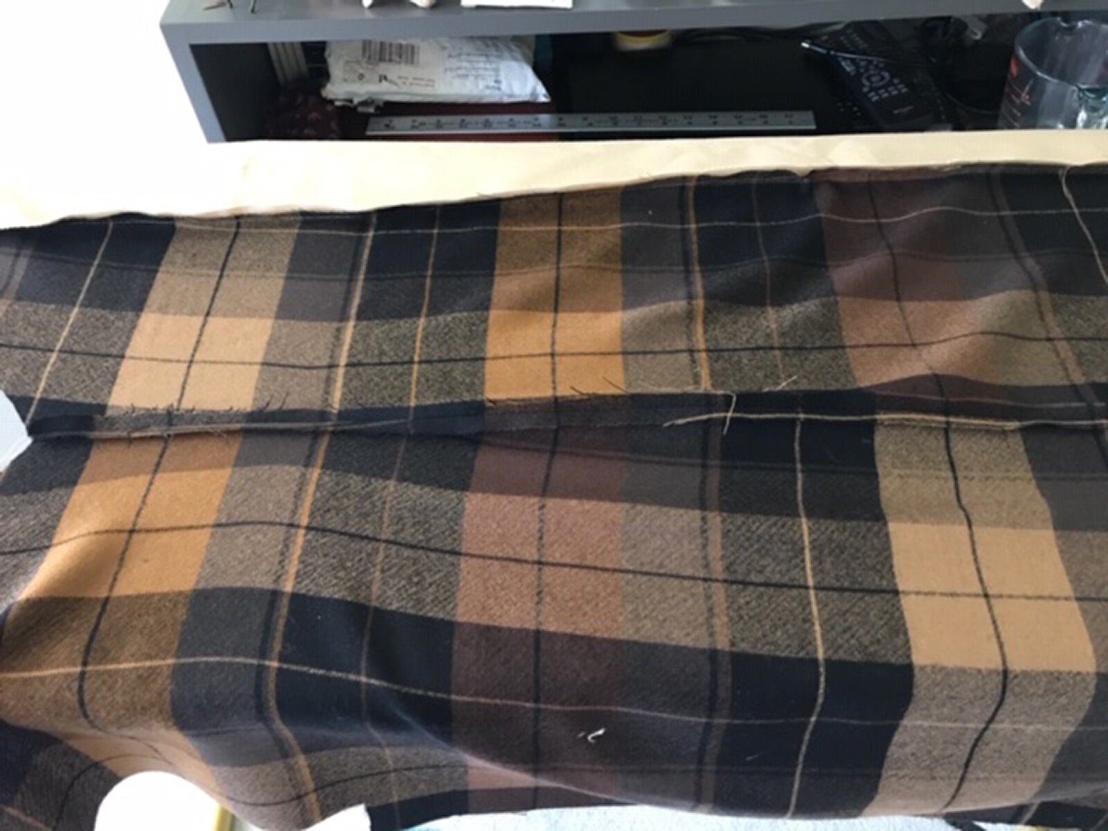 I purchased a plaid wool lining that was similar too, but still clearly not, the signature brand trench coat plaid. Here I was proud of how the lines of the plaid were matched after sewing two back lining pieces together.