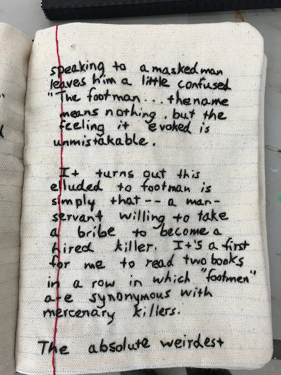 A page from one of Candace Hicks’ embroidered “Common Threads” composition notebooks, photographed during her Invisible Printmaking workshop at SGCI 2019 in Dallas. The writing and embroidered handwriting style are simultaneously casual and a little…
