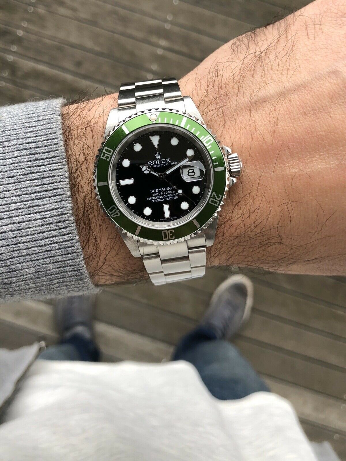 rolex kermit on wrist