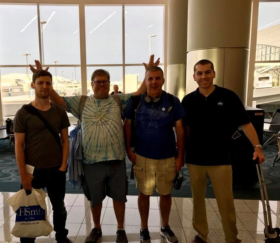 Alas, we could not convince the pilots to have a drink with us before the flight. L-R: Richard Garner, Jamie Rich, Tom McCool, and the author. (Photo: Tom McCool)