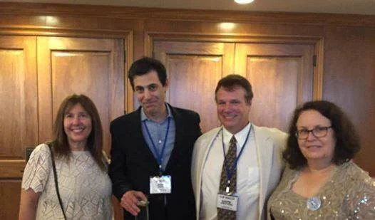 Josh Singer and Mark Armstrong pose with Space Hipsters Kathy Brown and Lois Huneycutt at the Banquet. (Photo: Lois Huneycutt)
