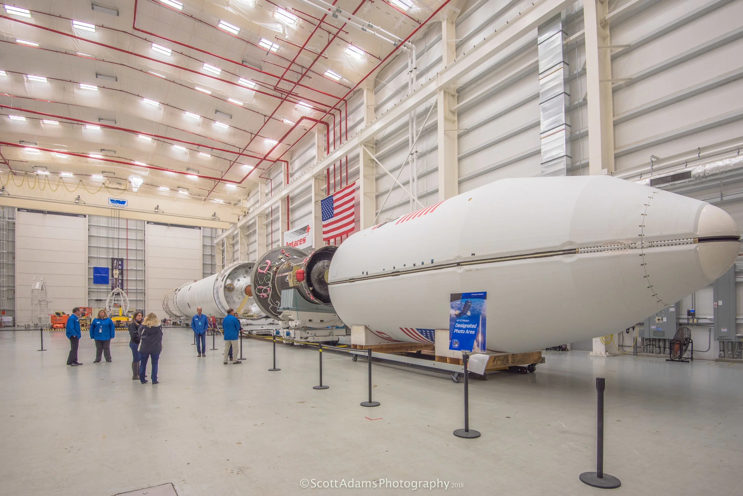 The NG-11 rocket inside the HIF at Wallops being readied for its April 2019 launch. Front-back: Payload fairing, solid-fuelled second stage, liquid-fuelled first stage with two RD-181 engines installed. (Photo: Scott Adams)