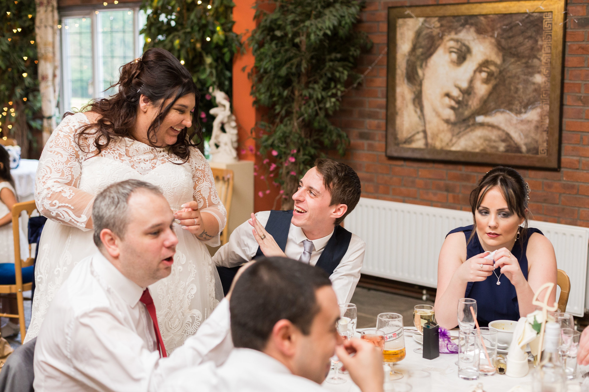 Brides shares a moment with guests, Heskin Hall