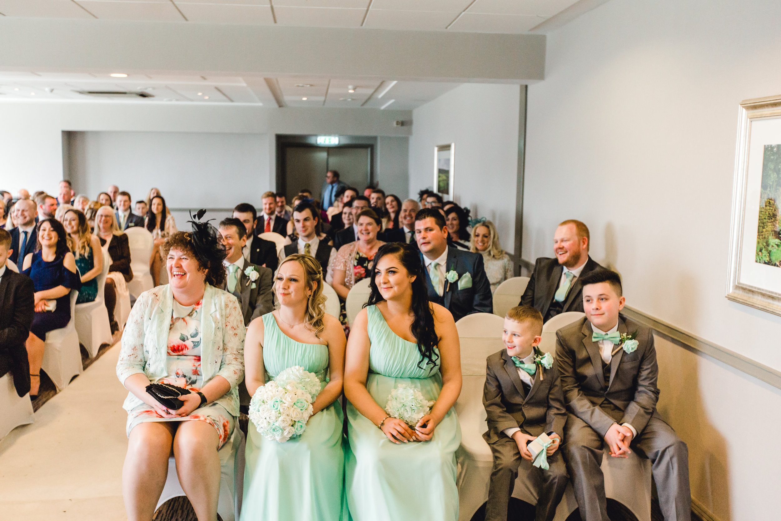 Wedding guests reactions at a wedding ceremony