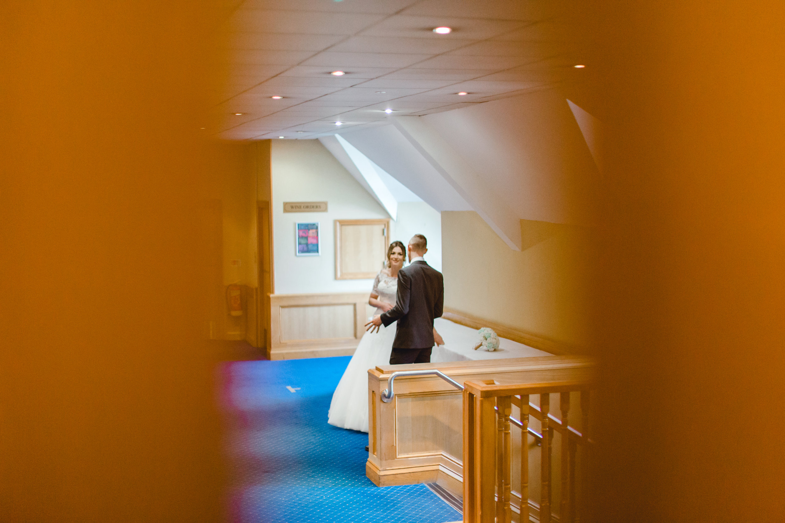 Image of bride and groom before entering the wedding breakfast room