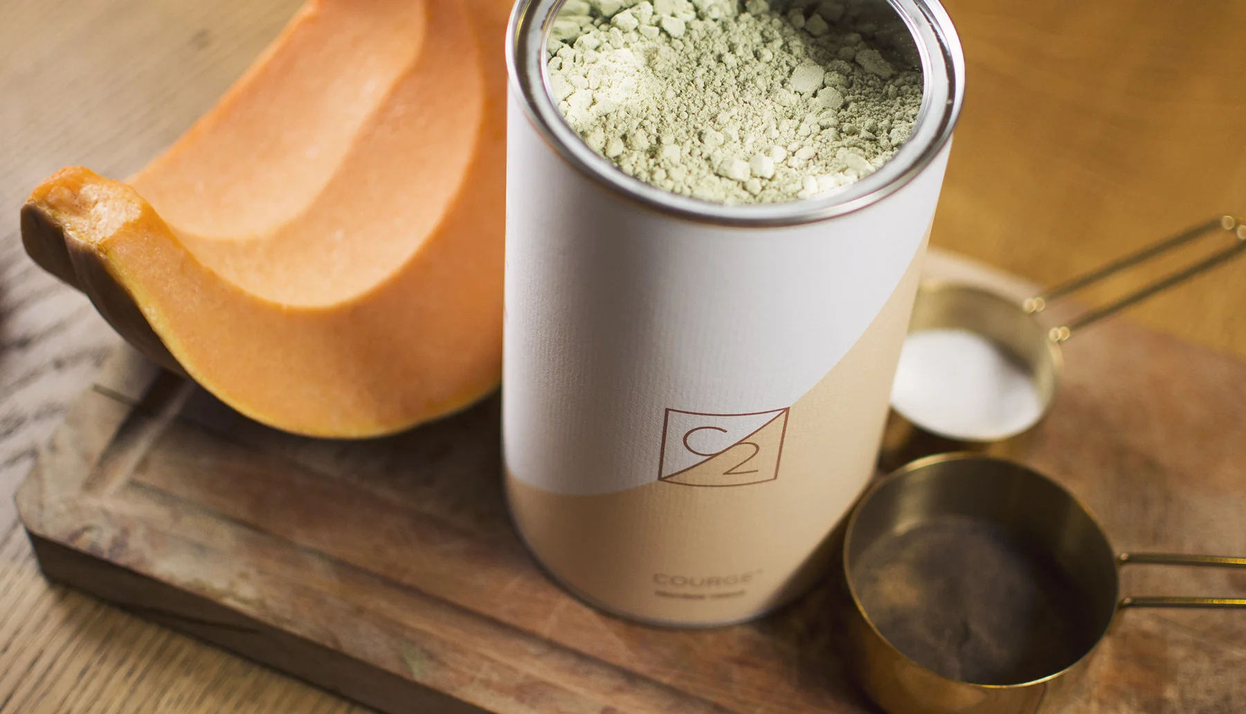 Pumpkin protein powder on wooden table