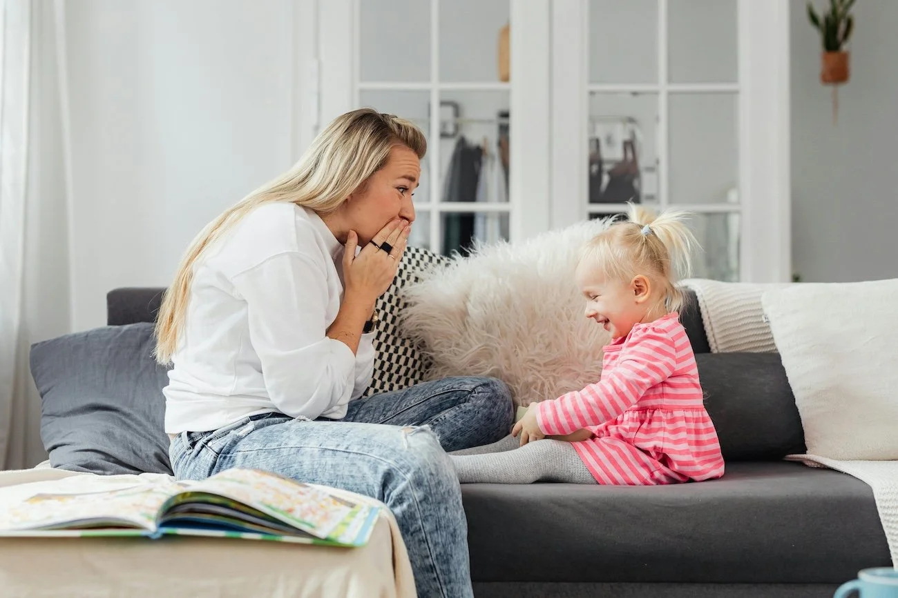 why couch has static sitting on the couch mom and child Minneapolis upholstery cleaning