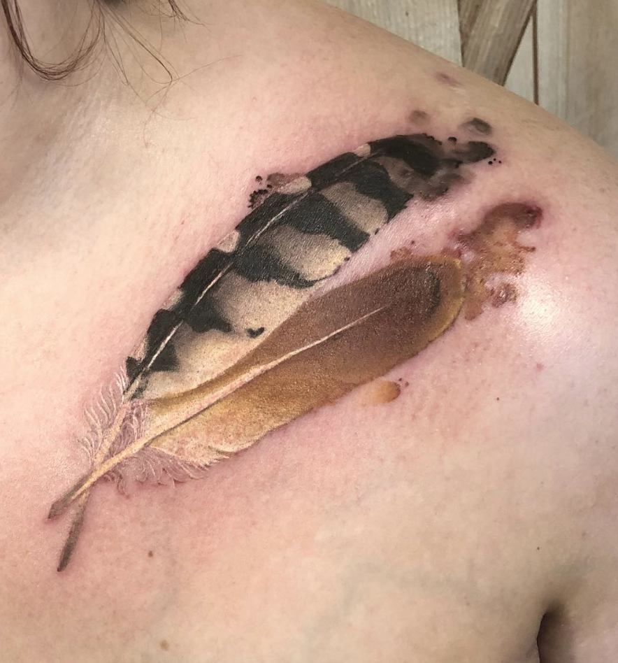 feather tattoo.png