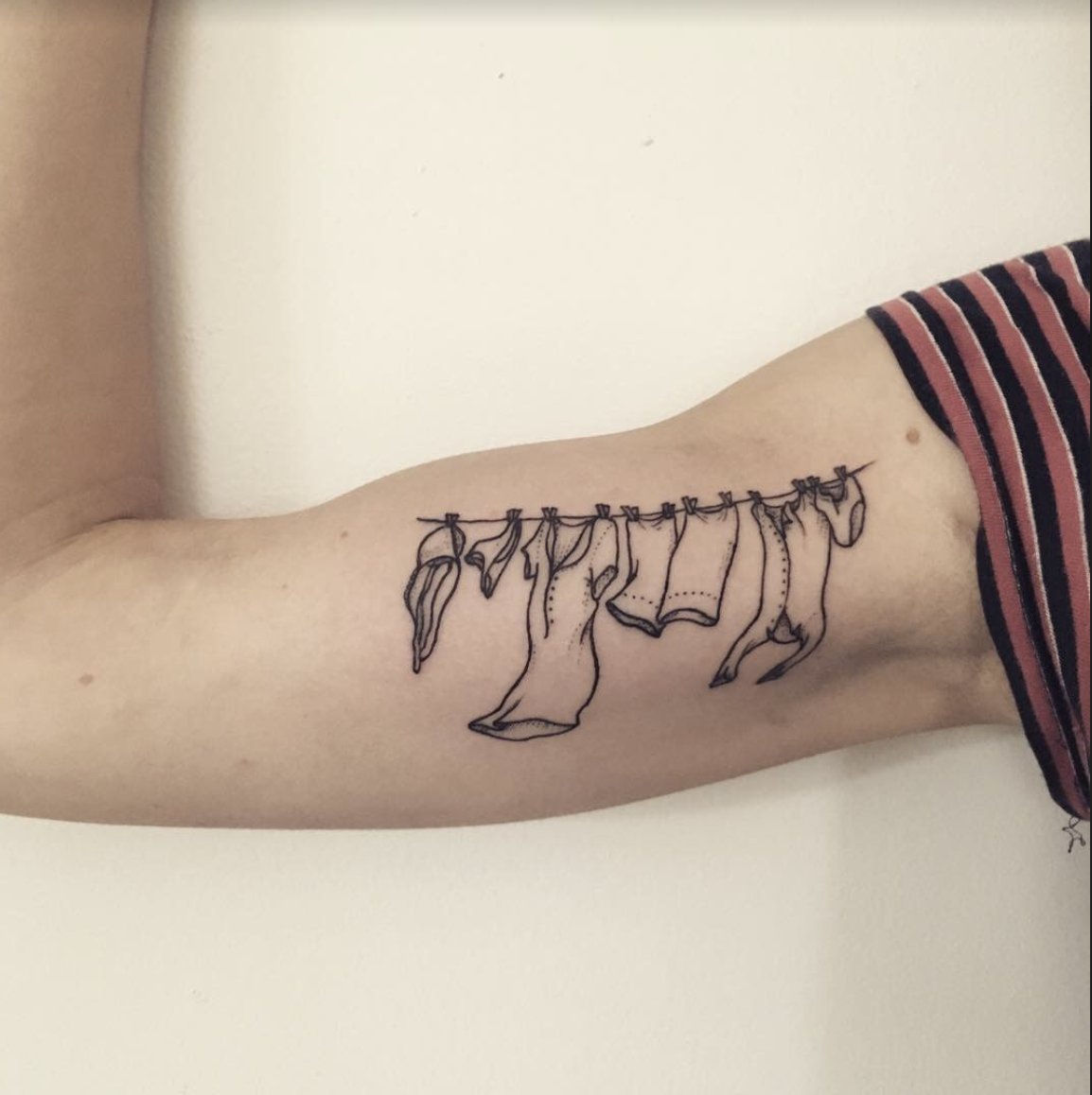 clothesline tattoo.png