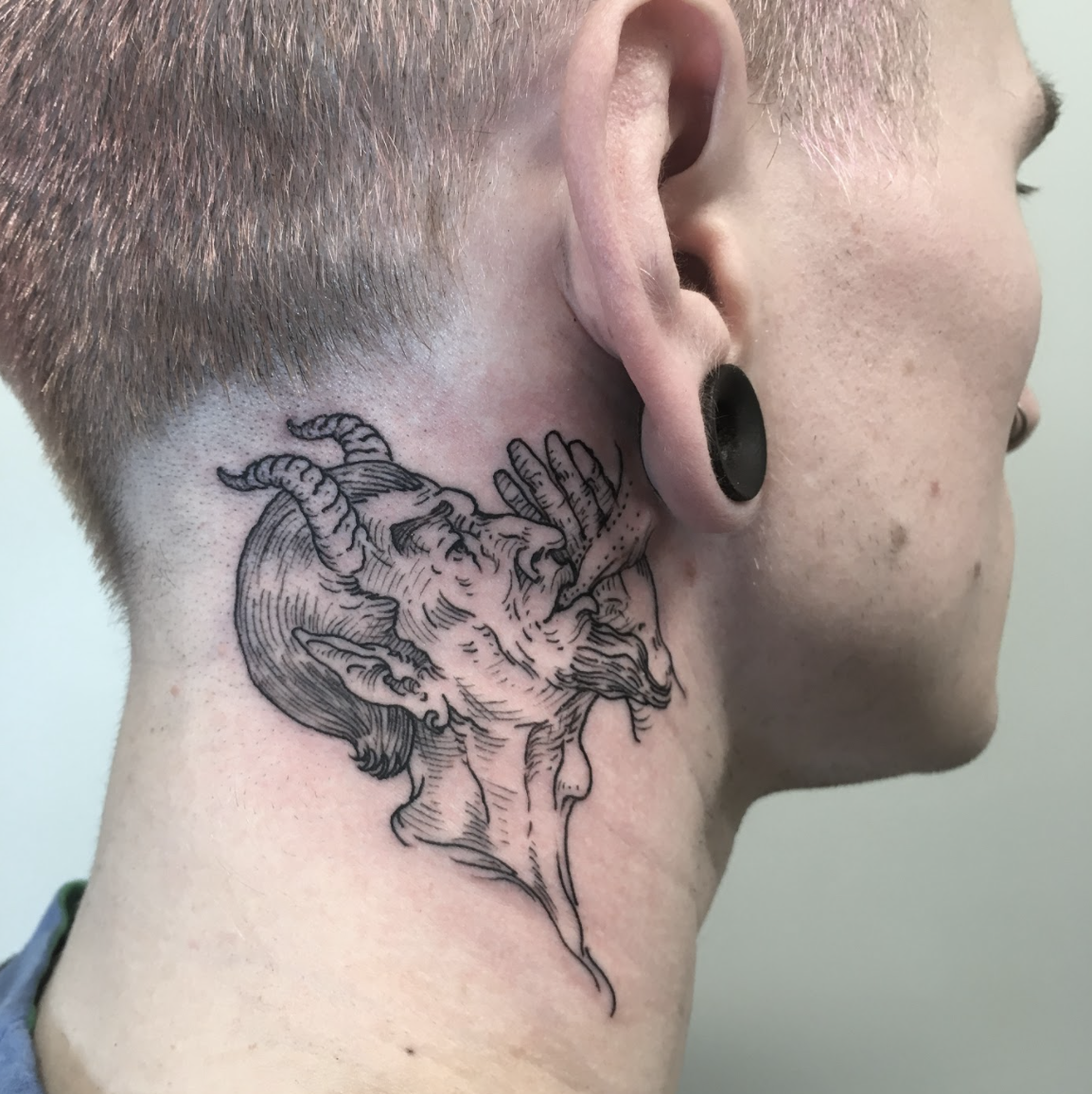 devil whispering in your ear tattooTikTok Search