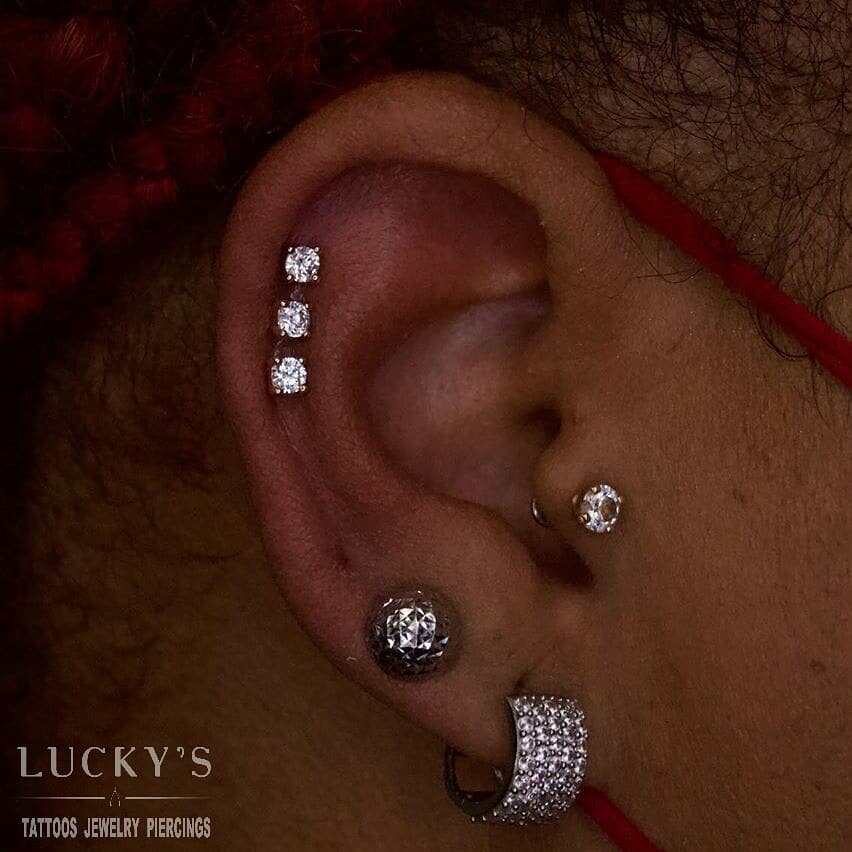 A beautiful triple helix done by @banditpiercing in our Boston studio! 💎💎💎 #luckysnoho #luckysboston #triplehelix #safepiercing