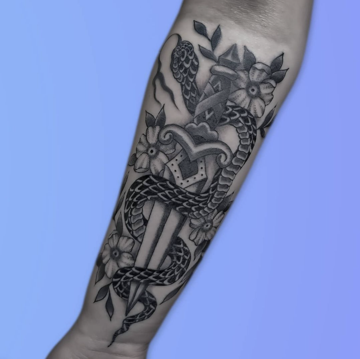 snake and dagger tattoo.png