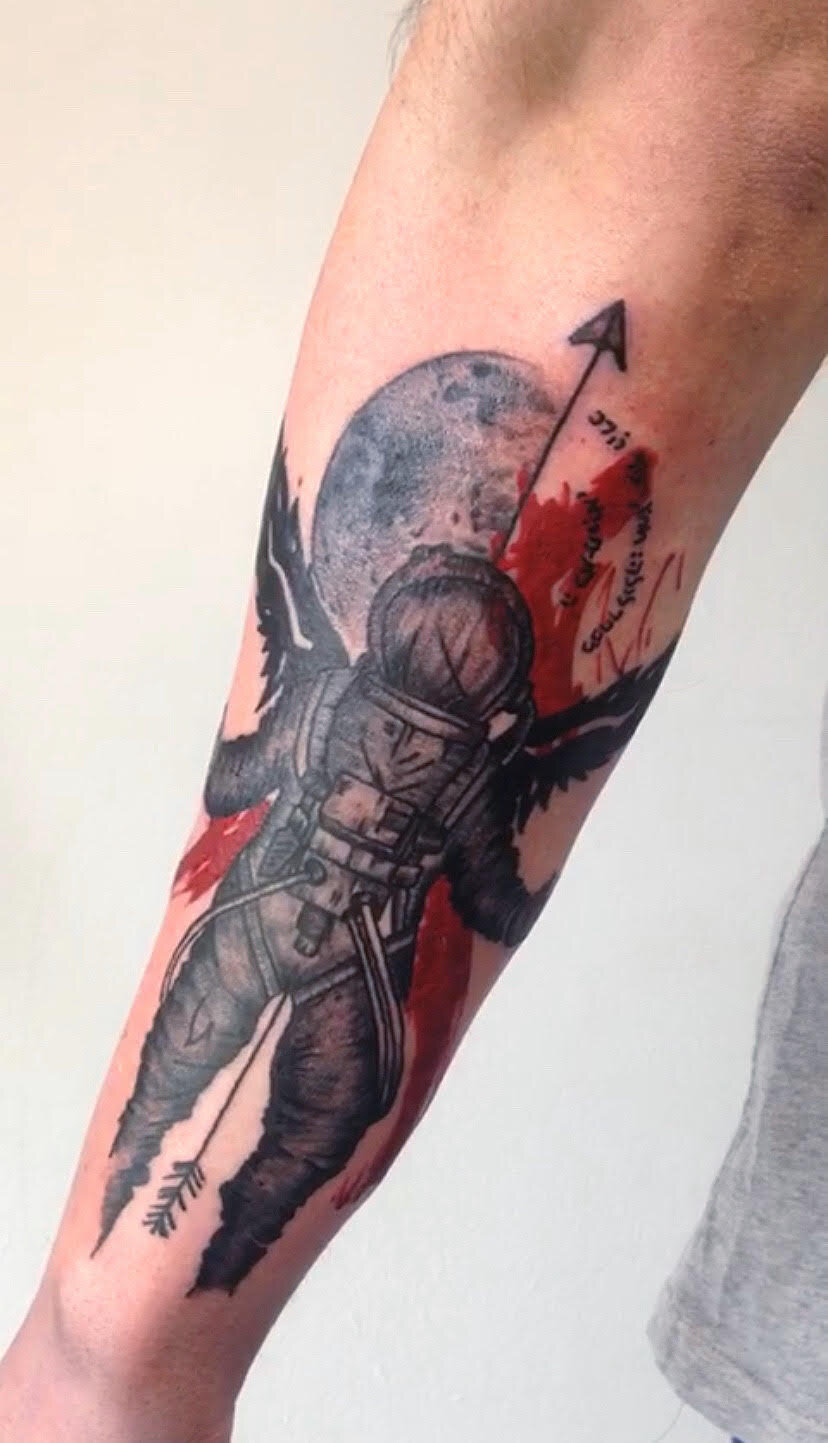 astronaut tattoo.jpg