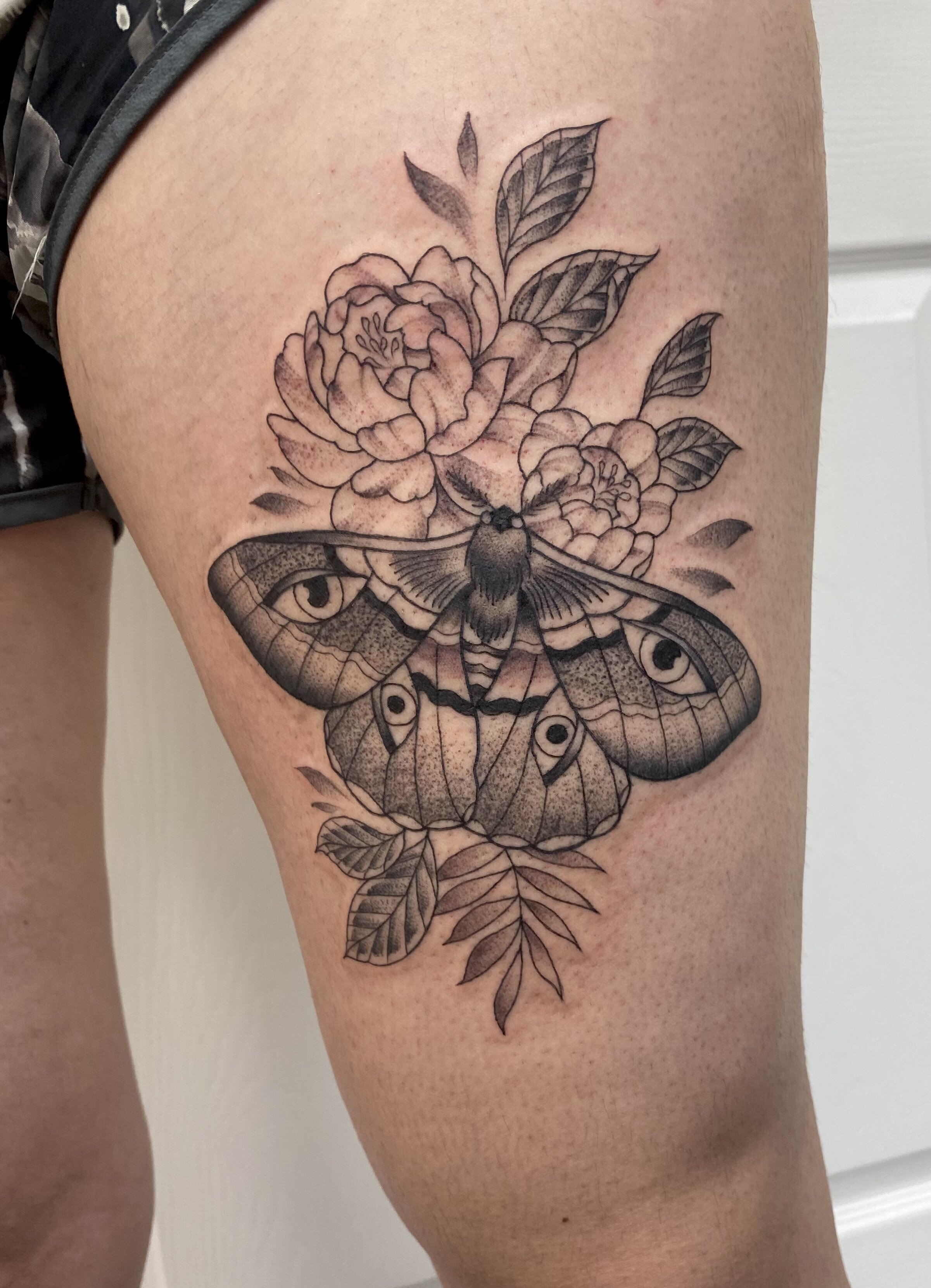 moth and flower tattoo.jpeg