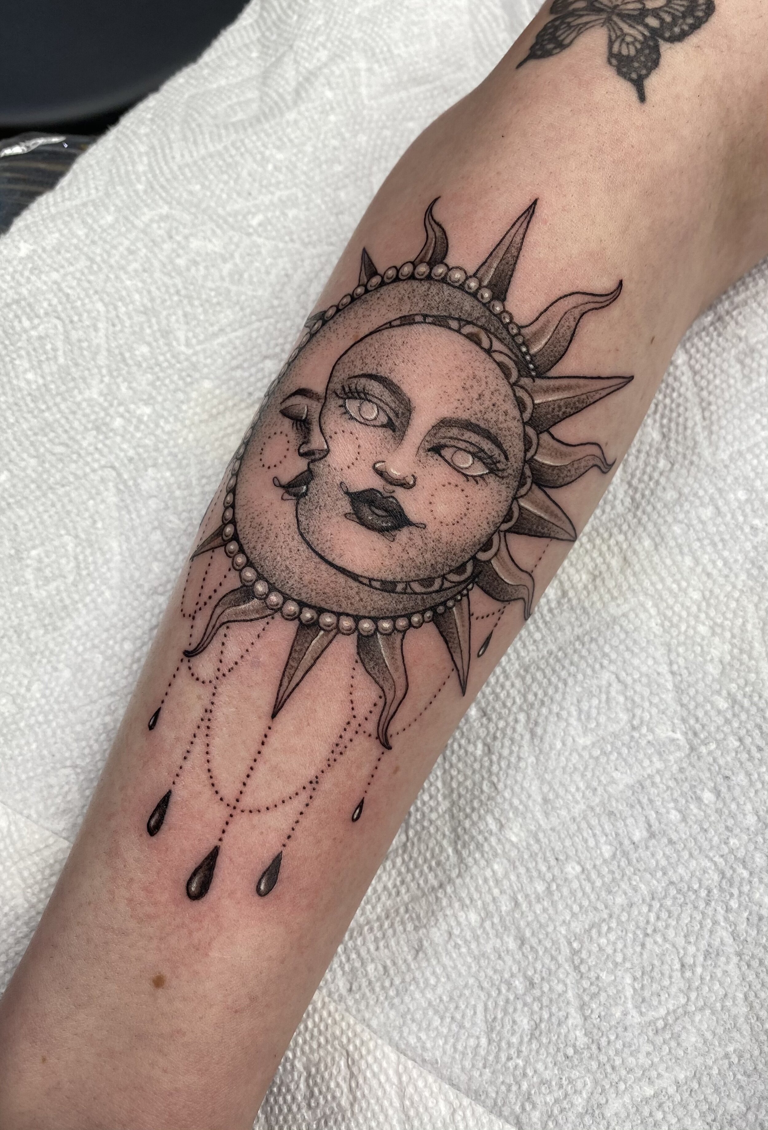 sun and moon tattoo.jpeg