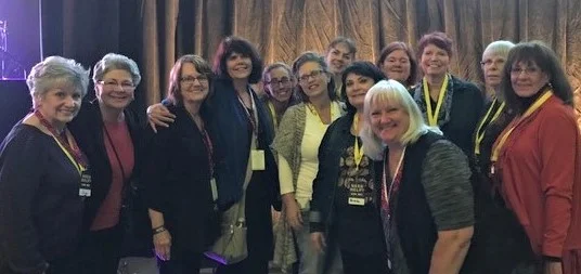 Executive Director, Diane Stores (3rd from left), and Assistant Director, Darlene Cook (front center), led prayer teams. They’re pictured here with some of the prayer team leaders.