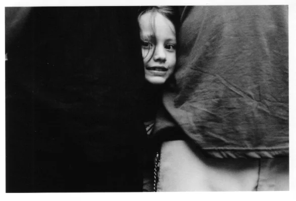 girl-through-adults_49823793_o.jpg