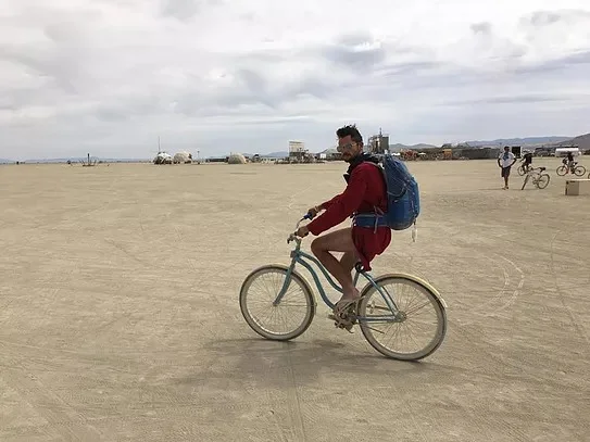 Your correspondent, trolling the playa. Photo credit: Matt Savoca