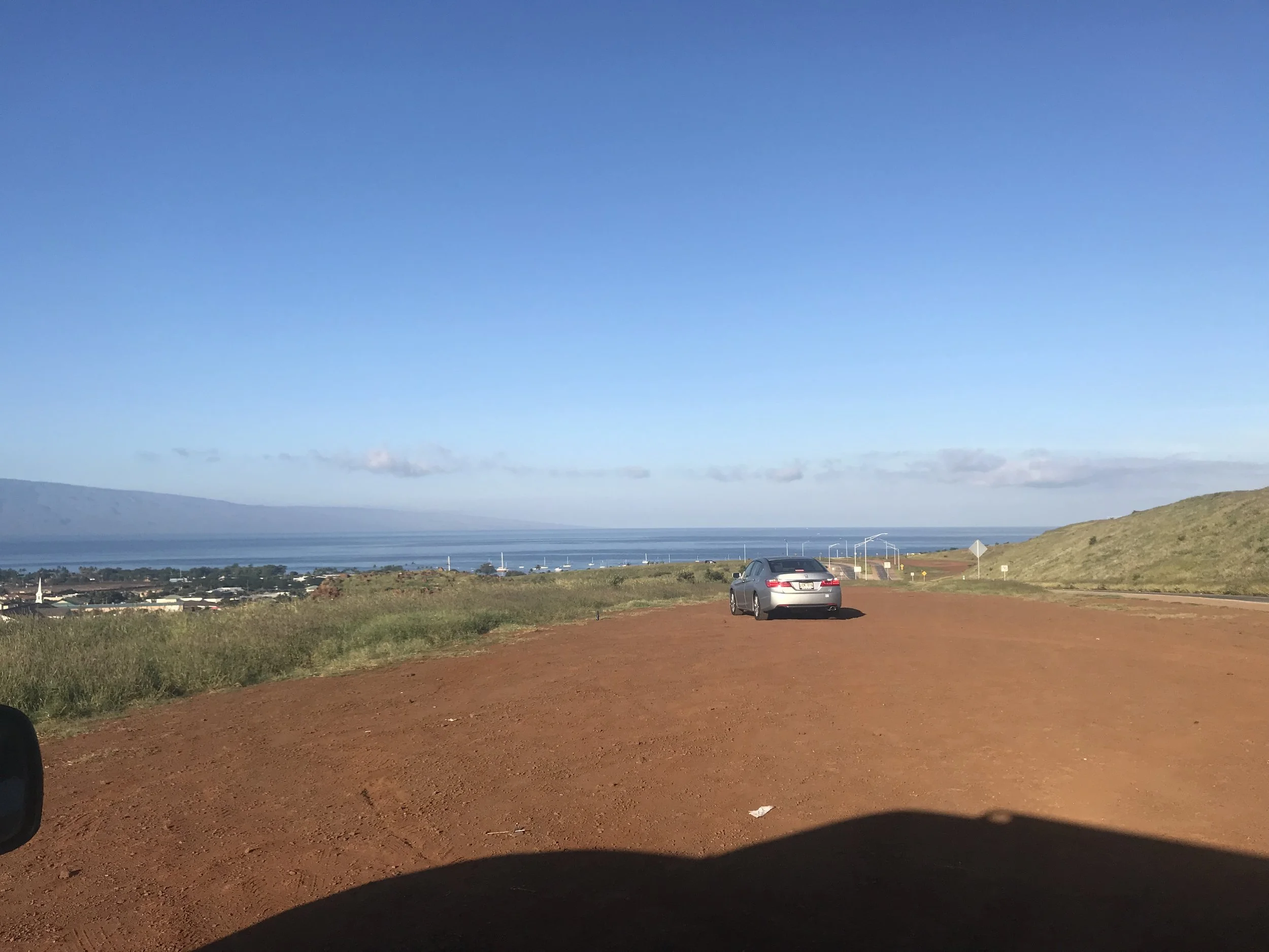 The Lahaina Bypass--safe enough from a tsunami. Oahu is about 80 miles from where I stood, in the middle of the horizon.