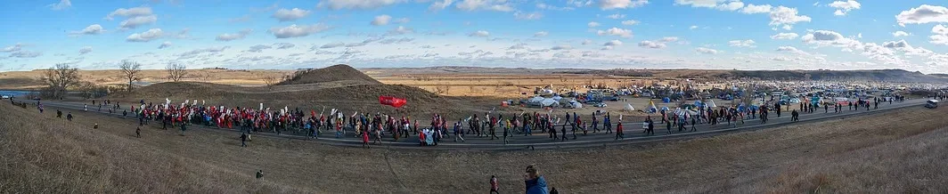 Water protectors marching towards an action