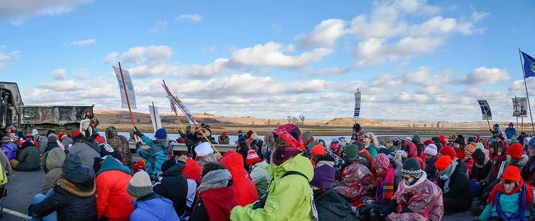 Water protectors engaging in an action