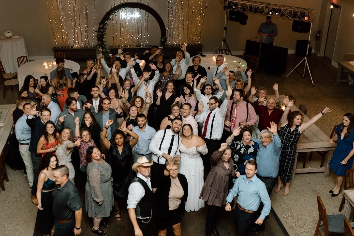 Nothing is better than a packed dance floor on your wedding day, I swear. Umm also, balcony in a reception space? Sign me up &amp; catch me running up those stairs to snag those birds-eye view of you dancing away celebrating forever with your favorit