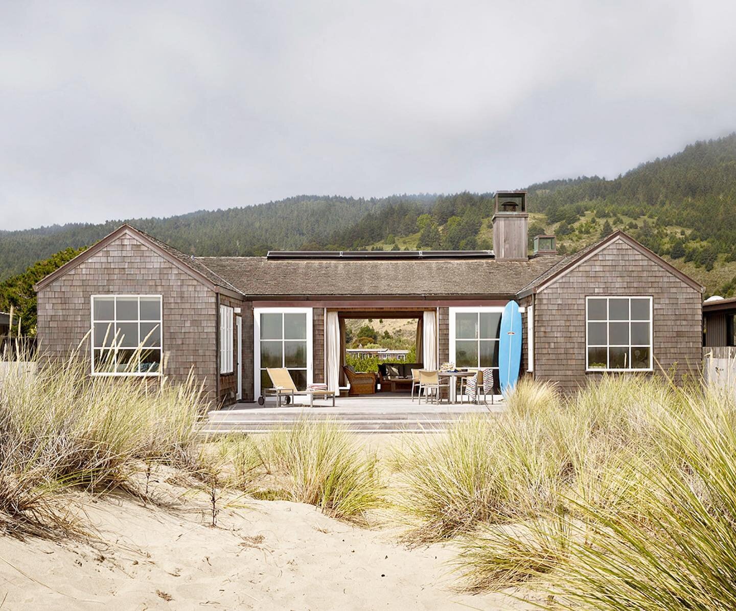 This is my dream... a modest beach house on the sand, with uninterrupted views of the mountains on one side and the Pacific on the other, covered in weathered timber shingles.

Stinson Beach House, California. Designed by @butlerarmsden_architects