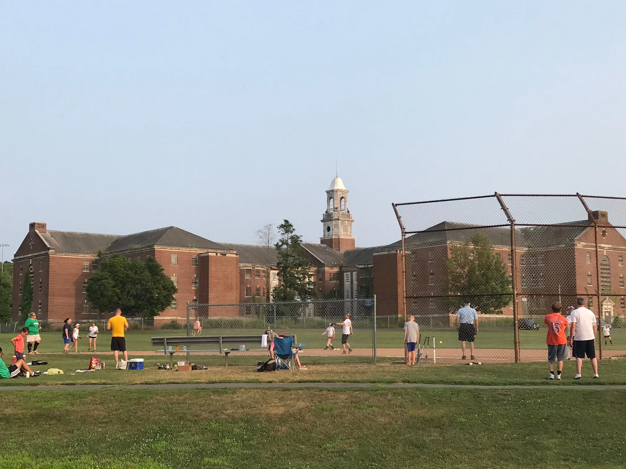 Huge decaying building provides a backdrop for tonight’s softball game.