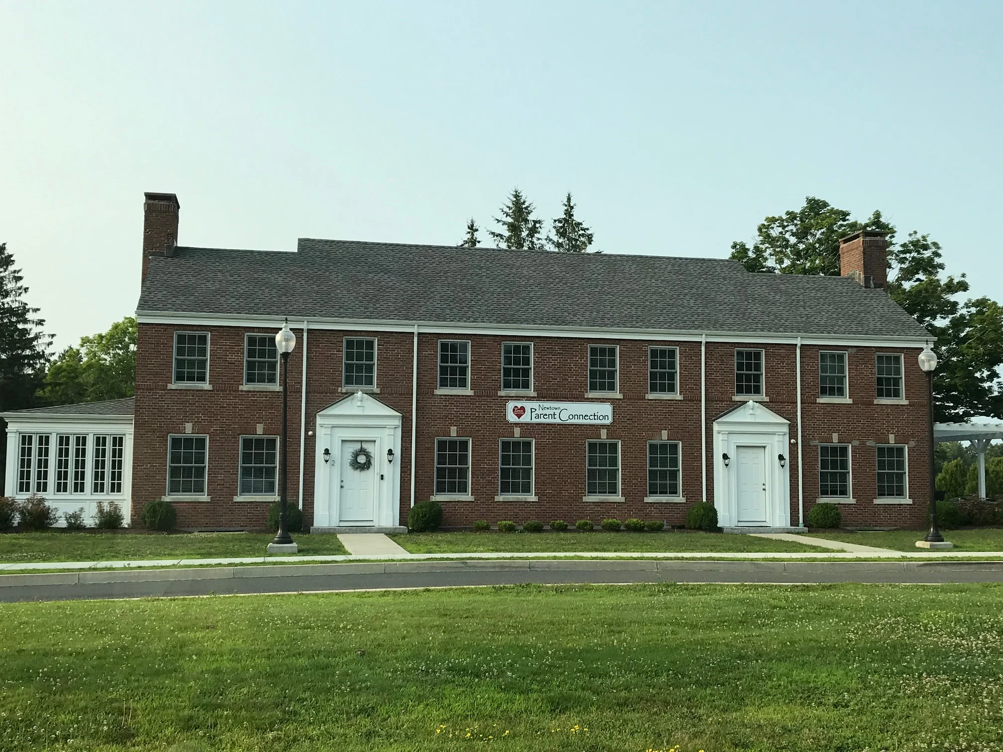 One of the former doctors’ residences is now an educational and support center for families in crisis.