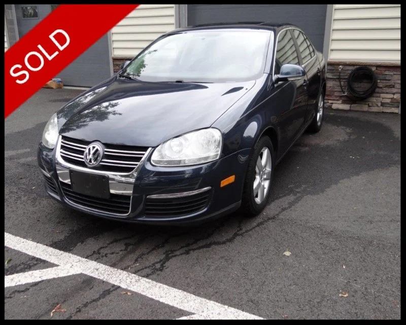 Blue Jetta Sold.jpg