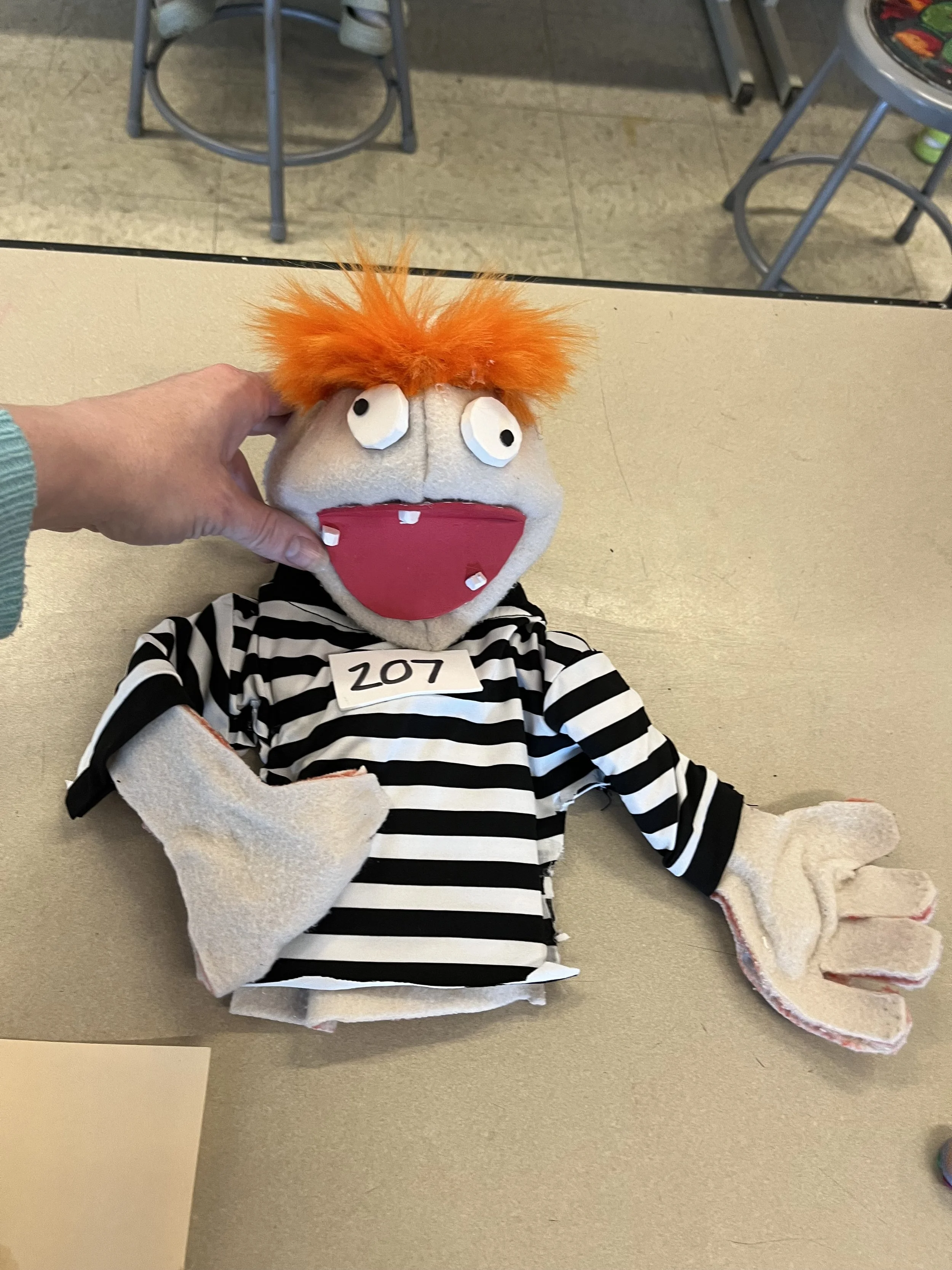 Puppetry Edison Orange Eyebrows Prison Shirt.jpeg