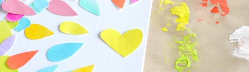 Brightly coloured, painted paper shapes on a white page shown side by side with a quick paint palette with bits of yellow, green, white and orange paint.